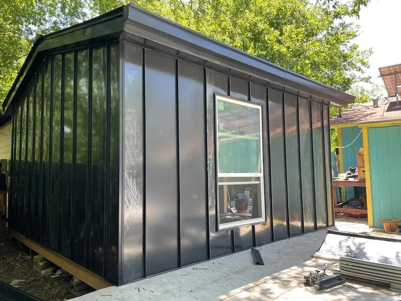 Black standing seam metal wall panels for Metal Roof Installation in Buxton